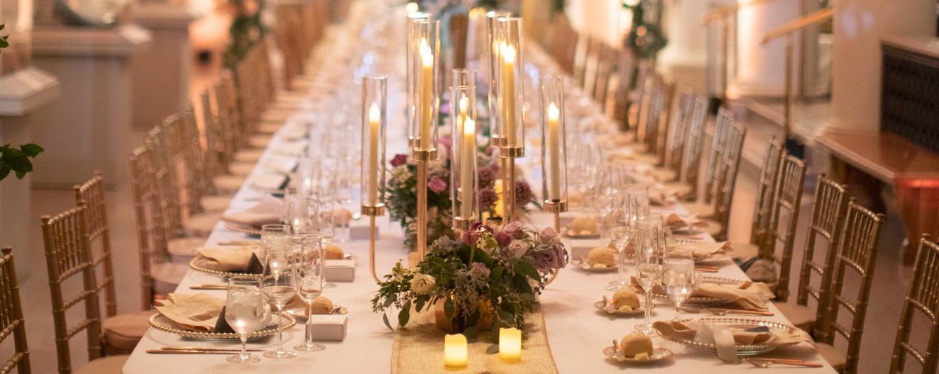 Lit candelabra on banquet table